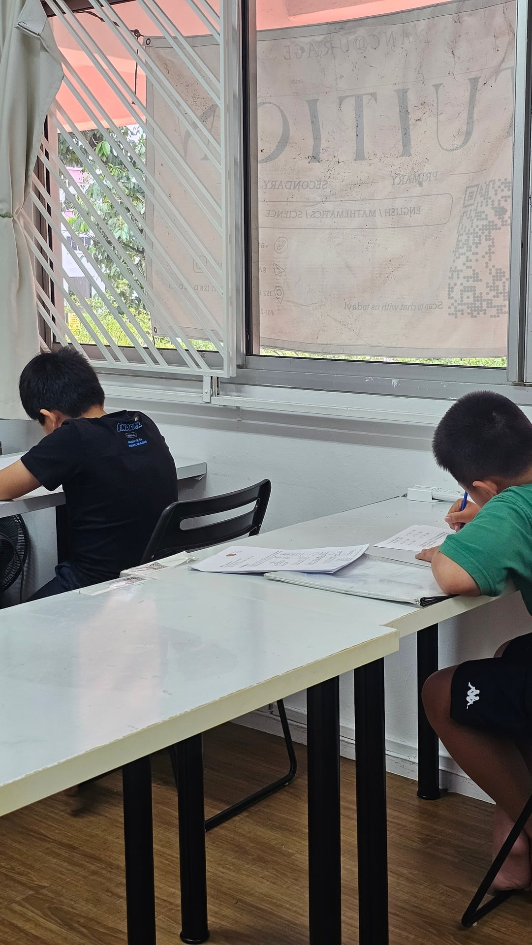 Primary Science students working together in a small group
